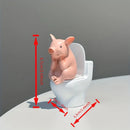 Figura Decorativa de Cerdito en el Inodoro Linden